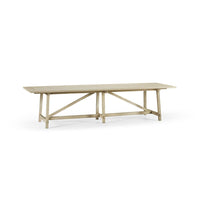 Timeless Sidereal French Laundry Dining Table 125" in Stripped Oak, shown in light natural oak and warm beige with oak wood.