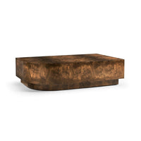 Jacques Radius Cocktail Table, shown in rich walnut brown and amber burl with burl wood veneer and solid wood substrate.