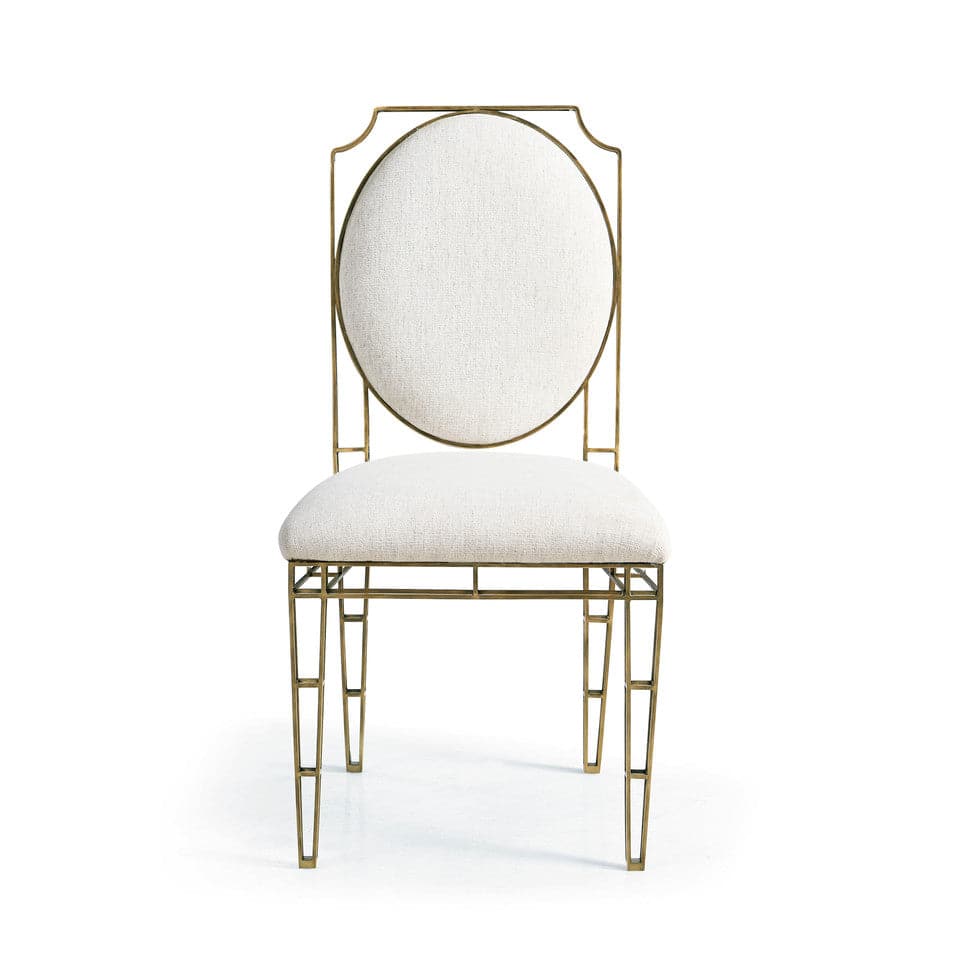 XO Side Chair, shown in ivory and antique brass with metal, fabric, and fixed armless frame.