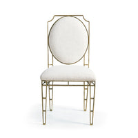 XO Side Chair, shown in ivory and antique brass with metal, fabric, and fixed armless frame.