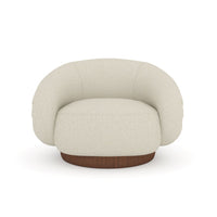 Additional view of Smoosh Swivel Lounge Chair in cream and off-white, featuring nubby textured upholstery and a swivel base.