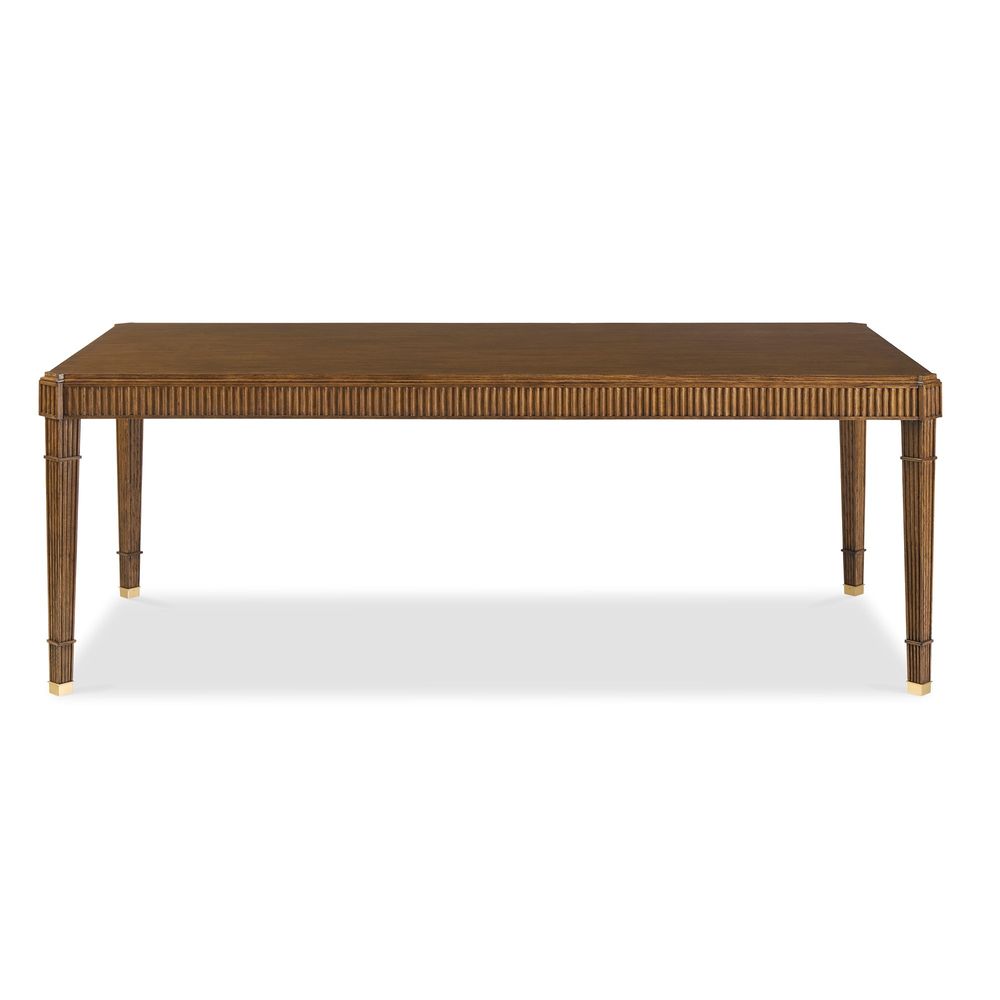 Maddy Dining Table- 120", shown in medium brown and warm oak brown with wood, brass, and a rectangular dining surface.