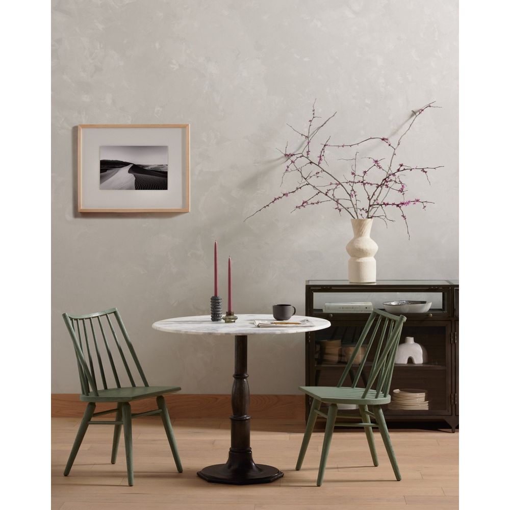 Additional view of Lucy Bistro Table in white and charcoal, featuring polished stone finish and a pedestal base.