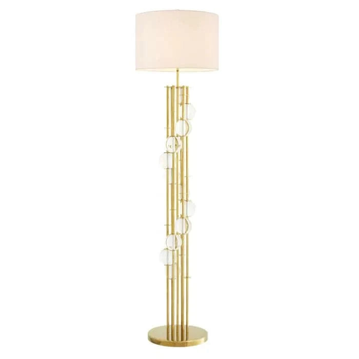 Floor Lamp Lorenzo, shown in gold and white with metal, glass, and a drum shade.