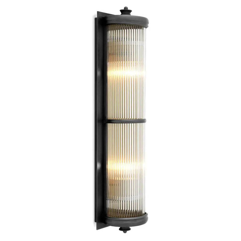 Alternate view of Wall Lamp Glorious, featuring brushed brass finish, metal, ribbed glass, and a wall-mounting backplate.