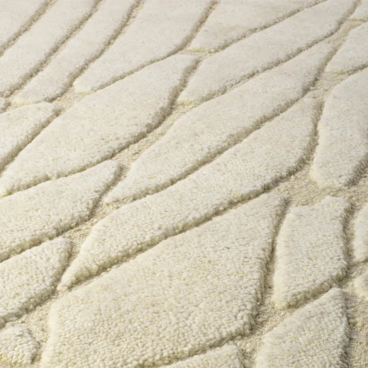 Rug Coralie Ivory 200 X 300 Cm, shown in ivory and cream with wool and high-low sculpted pile.
