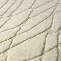 Rug Coralie Ivory 200 X 300 Cm, shown in ivory and cream with wool and high-low sculpted pile.