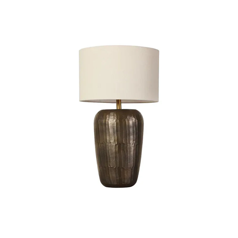 Ishani Table Lamp, shown in bronze-brown and cream with metal, fabric, and a table lamp base.