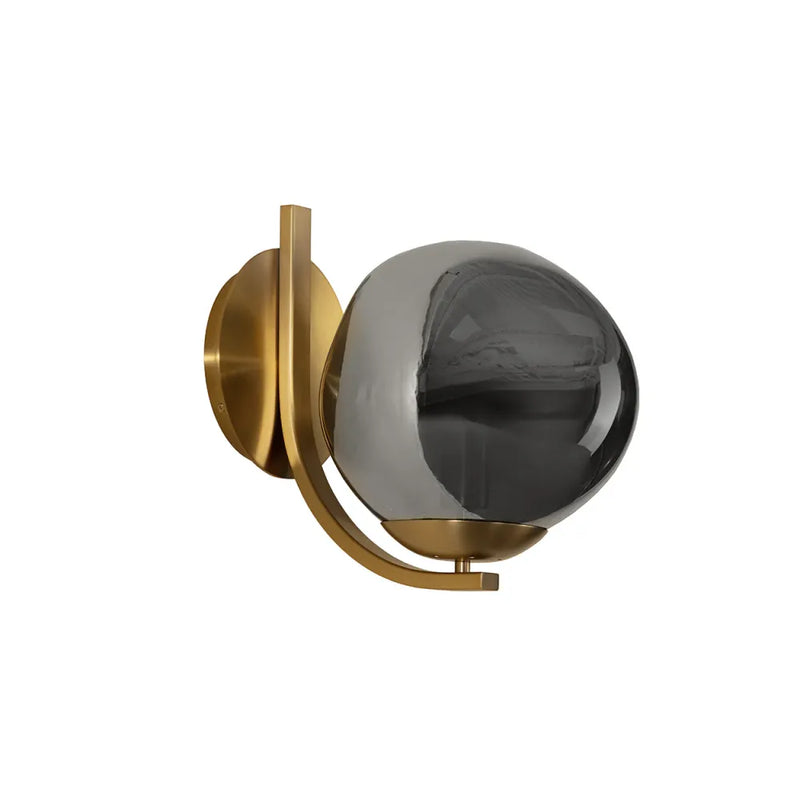 Dionis Sconce, shown in brushed gold and smoked gray with iron, glass, and a wall-mounting backplate.