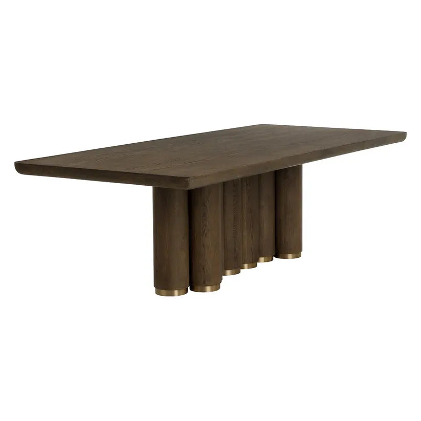 Alternate view of Salix Dining Table, featuring brushed metal caps, wood, brass, and fixed multi-cylinder pedestal base.