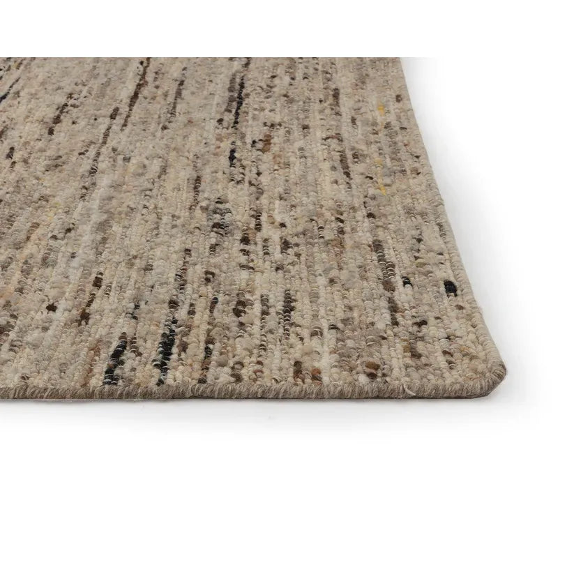 Additional view of Terena Hand-woven Rug in beige and taupe, featuring textured finish and hand-woven construction.