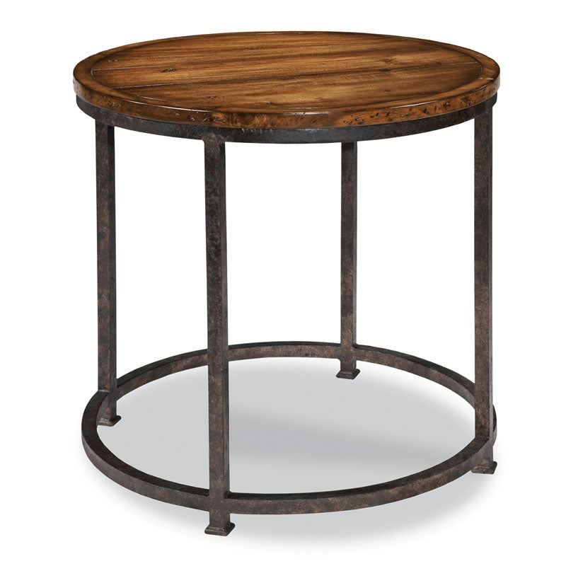 Utilitaire Side Table, shown in warm medium brown and dark bronze-brown with solid wood, iron metal, and fixed round top.