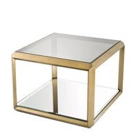 Side Table Callum, shown in brass gold and clear with metal, glass, and lower mirrored shelf storage.