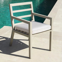 Alternate view of Dining Chair Delta, featuring matte powder coat, aluminum, solution-dyed acrylic fabric, and fixed arms.