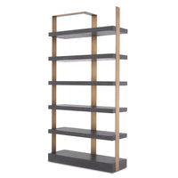 Geo Bookcase, shown in charcoal grey and brushed brass with oak veneer, metal, and six open fixed shelves.