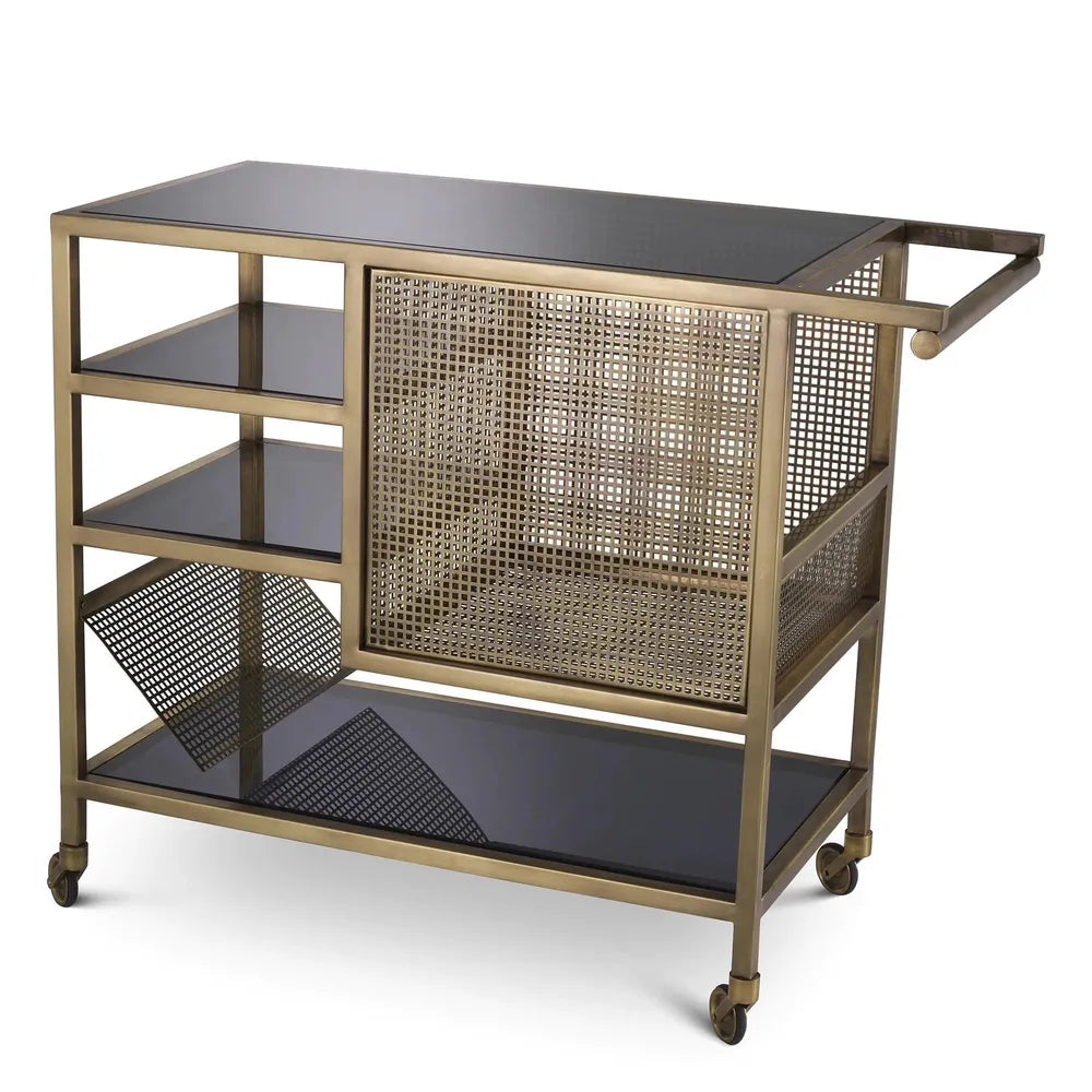 Trolley Sterling Bar Cart, shown in antique brass and black with metal, glass, and casters.