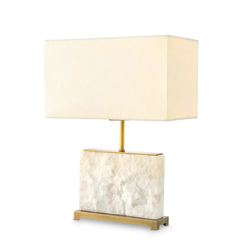 Table Lamp Newton Small, shown in cream and beige with stone, travertine, and a table lamp base.