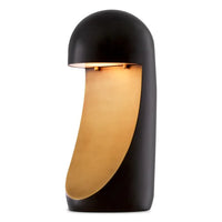 Table Lamp Arion, shown in matte black and warm gold with metal and integrated directional uplight/downlight cavity.