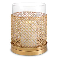 Hurricane Zimmerman, shown in gold and clear with glass, rattan, and single-candle hurricane enclosure.