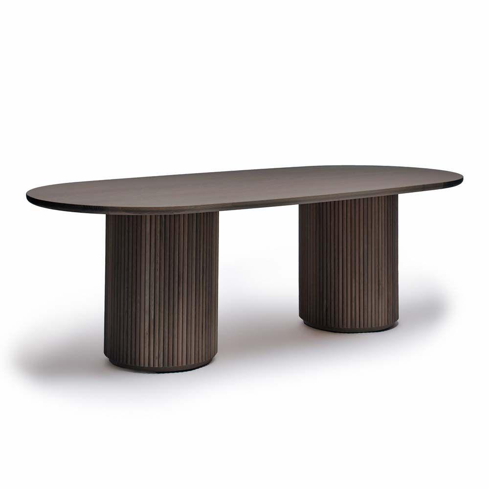 Laurel Dining Table, shown in warm medium brown and natural light oak with wood and dual fixed pedestal bases.