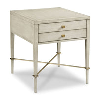 Stella Side Table, shown in light gray and greige with wood, brass, and two stacked drawers.