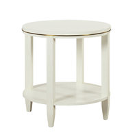 Antioch Side Table, shown in ivory and off-white with wood, metal, and integrated lower circular shelf.