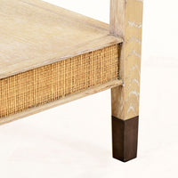 Additional view of Carrick Console Table, featuring whitewashed, wood, raffia, and full-length lower open shelf.
