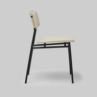 Additional view of Albert Dining Chair in cream and black, featuring matte upholstery finish and armless.