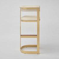 Additional view of Darcy II Stool in gold and cream, featuring satin brass finish and integrated footrest.