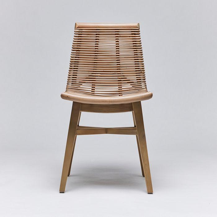 Sanibel Dining Chair, shown in taupe and natural tan with solid wood, cane, and armless open sides.