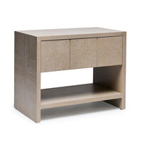 Lowell Bedside Chest, shown in light taupe and warm beige with wood and three drawers.