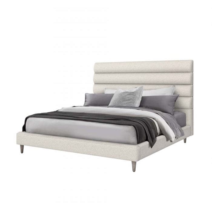 Channel Queen Bed, shown in ivory and off-white with upholstery fabric, wood, and a fully upholstered platform base.