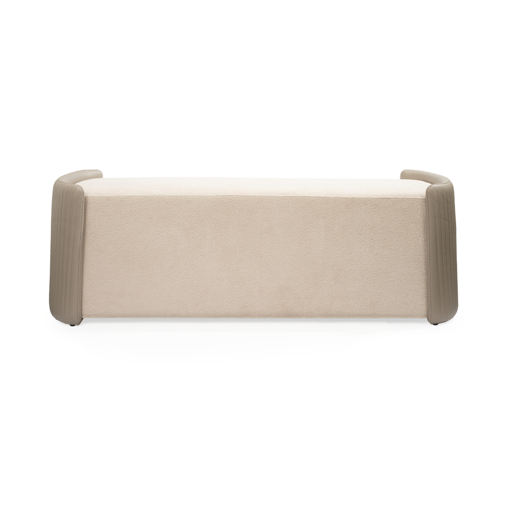 Hug Bench, shown in cream and beige with bouclé fabric, leather or leatherette, and fixed low end arms.