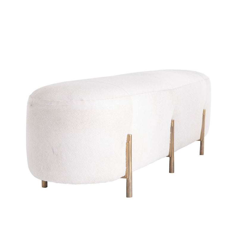 Justin Bench, shown in ivory white and off-white with hair-on-hide, cast metal, and a backless armless bench seat.