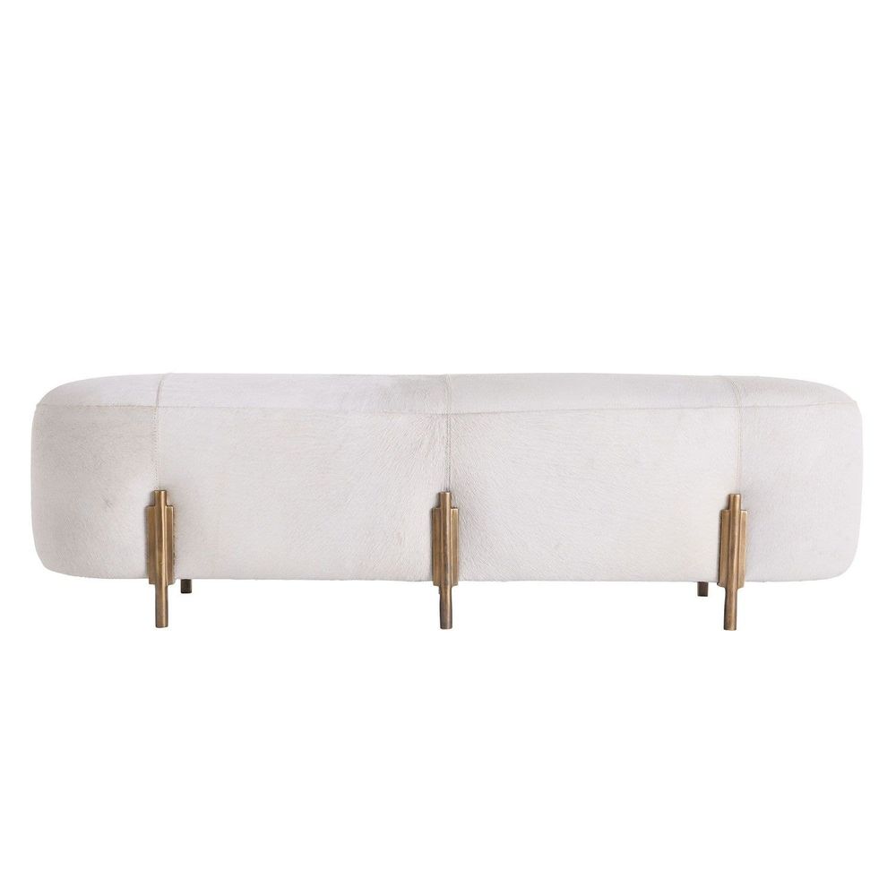 Additional view of Justin Bench, featuring antique brass finish, hair-on-hide, cast metal, and a backless armless bench seat.