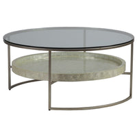 Cumulus Capiz Round Cocktail Table, shown in champagne and ivory with glass and metal.