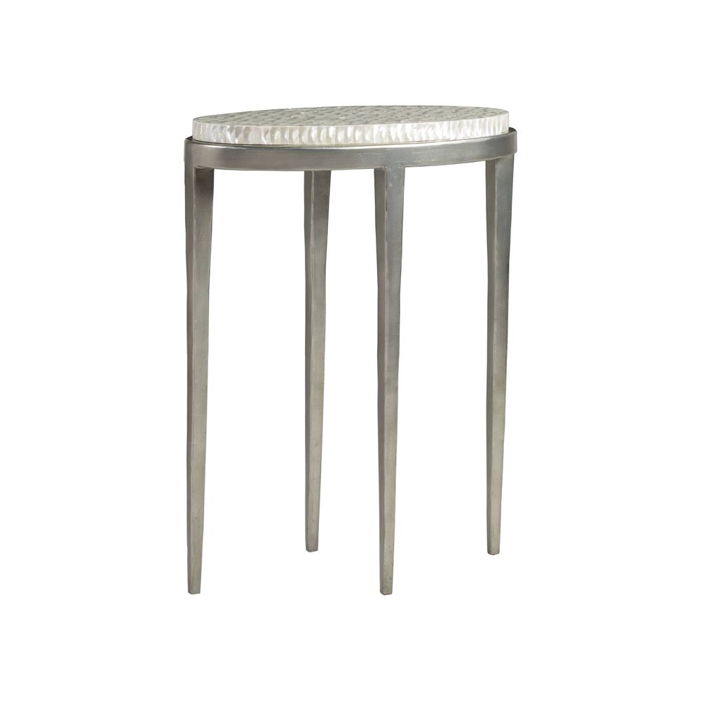 Brilliante Spot Table, shown in silver and ivory-white with metal, capiz shell, and a compact oval surface.
