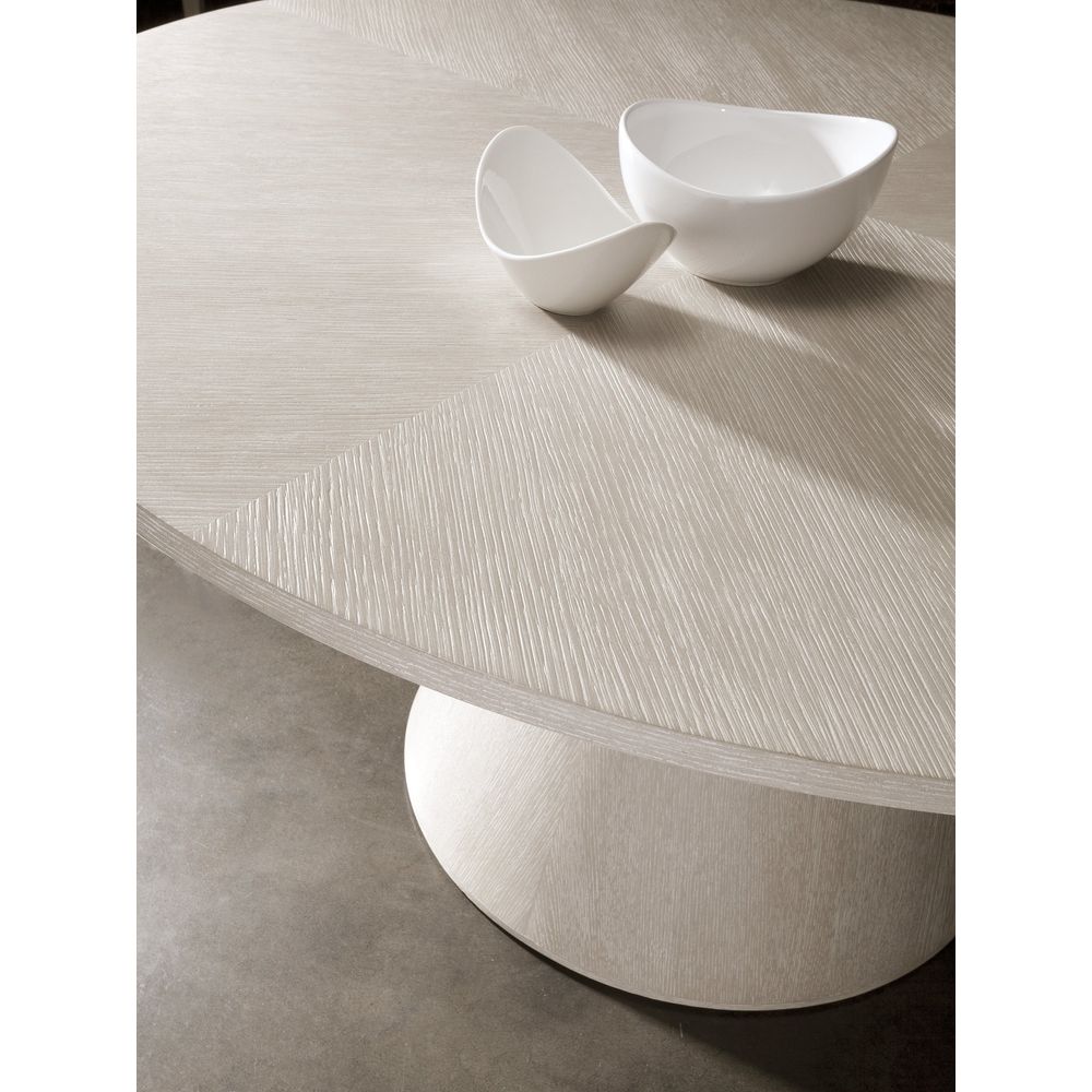 Additional view of Mar Monte Round Dining Table in taupe and warm beige, featuring matte finish and a single pedestal base.
