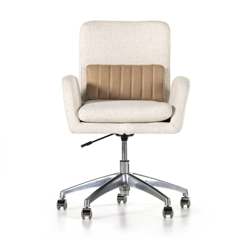 Leda Desk Chair, shown in cream and off-white with woven performance fabric, leather, and a swivel base.