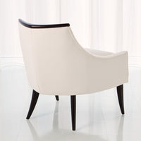 Alternate view of Boomerang Chair, featuring smooth upholstery finish, leather, wood, and fixed low arms.