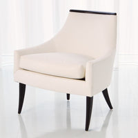Additional view of Boomerang Chair in ivory and cream, featuring smooth upholstery finish and fixed low arms.