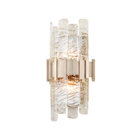 Ciro Wall Sconce, shown in clear and antique silver with textured glass, metal, and wall-mounting hardware.