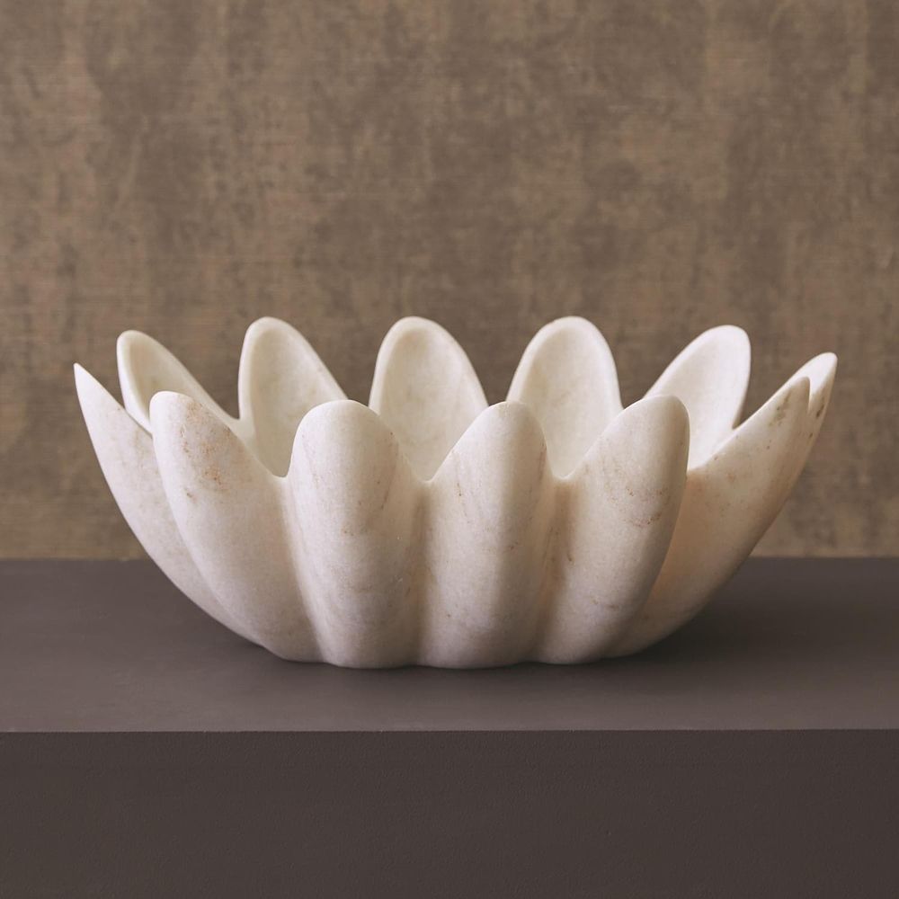 Gingerleaf Bowl, shown in ivory and off-white with marble, stone, and open shallow vessel.