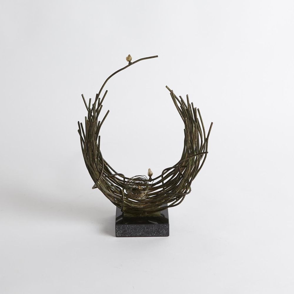 Additional view of Bird's Nest, featuring verdigris patina, metal, stone, and a freestanding cubic stone base.