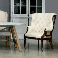 Alternate view of Irish Chair, featuring deep button tufting, woven fabric, hardwood, and fixed arms.