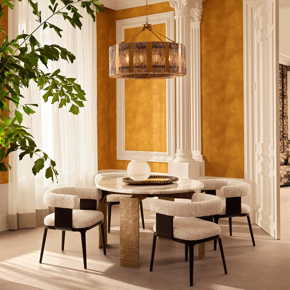 Alternate view of Dining Table Bodega Round Antique Brass Finish in ivory and beige.
