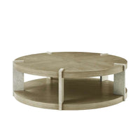 Catalina Round Cocktai Table, shown in light oak beige and dark espresso brown with figured ash wood and stone.
