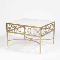 C-Fret Cocktail Table-Gold, shown in gold and white with marble, metal, and fixed four-leg base.