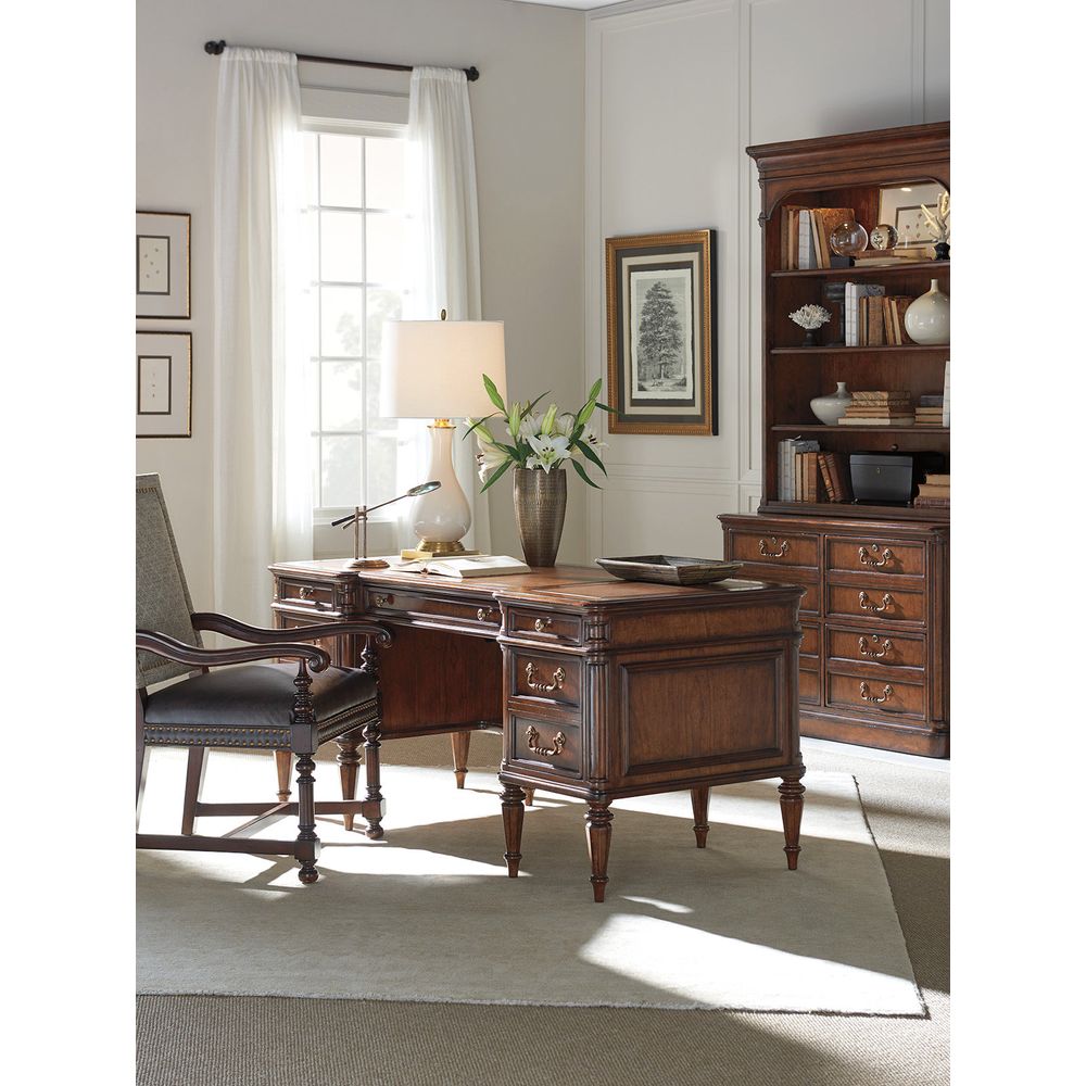 Alternate view of Wesley Desk, featuring polished brass finish, wood, leather, and a double pedestal base.