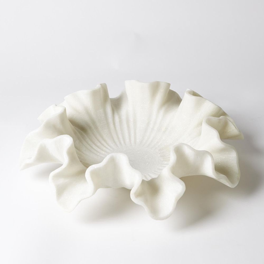 Marble Ruffle Bowl, shown in white and off-white with marble and open shallow vessel.